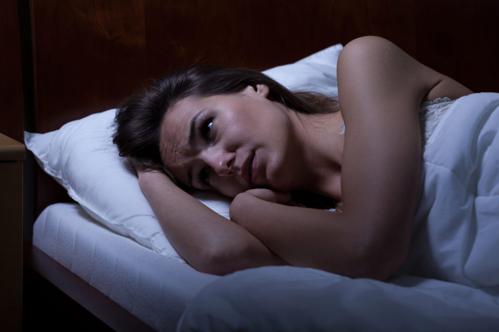 View of woman can't sleep during night